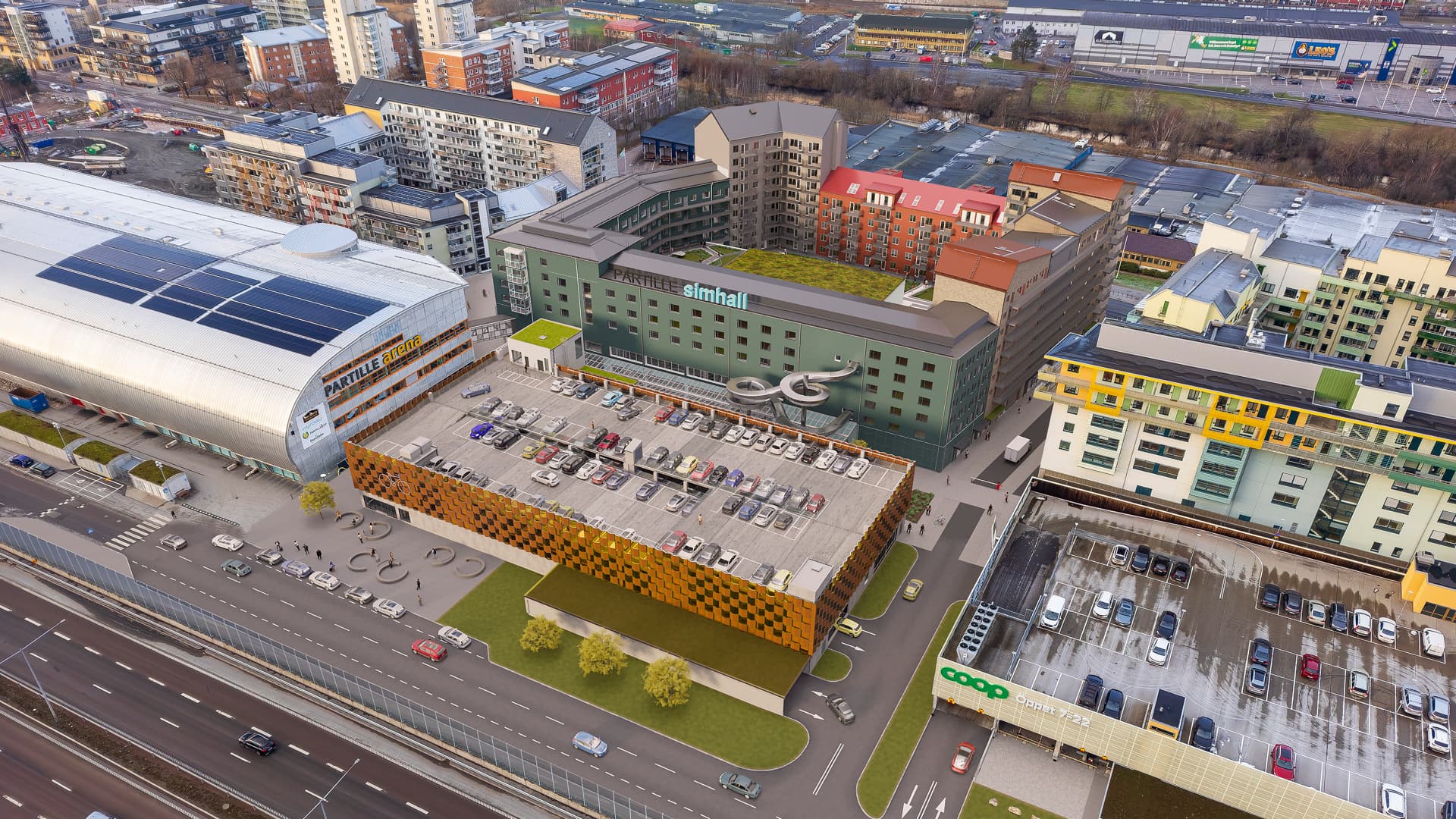 En glasövergång mellan Simhallskvarteret och Partille arena knyter ihop husen. Ett stort parkeringshus med mobilitetshubb ingår i byggprojektet.